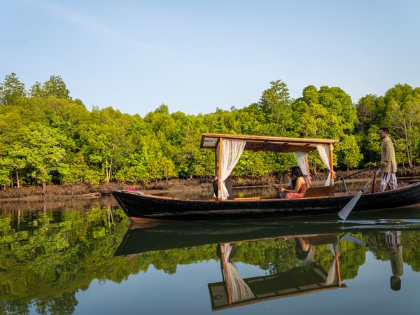 Traditional gondola during mangrove tour in Koh Lanta