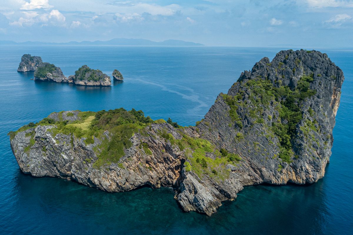 Aerial drone photography showcasing tropical islands and crystal clear waters